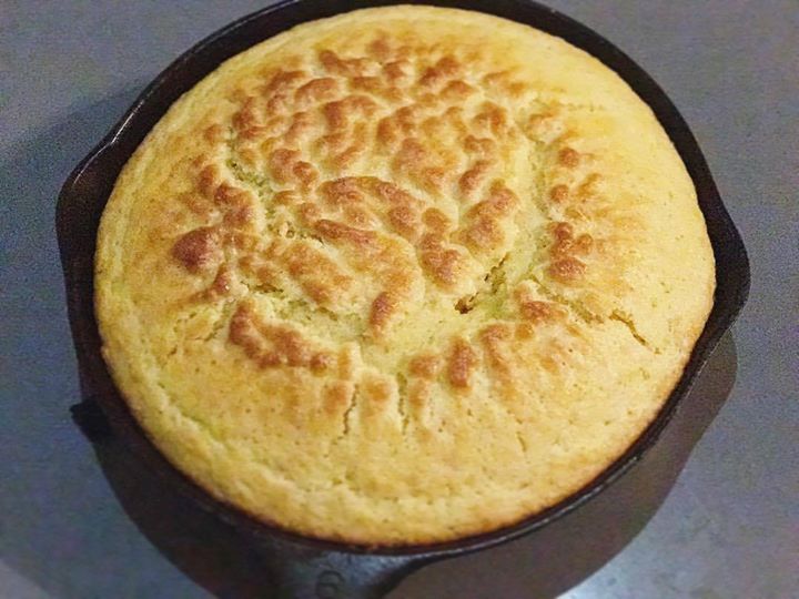 Sweet Cornbread in a cast iron skillet with perfect browning on top