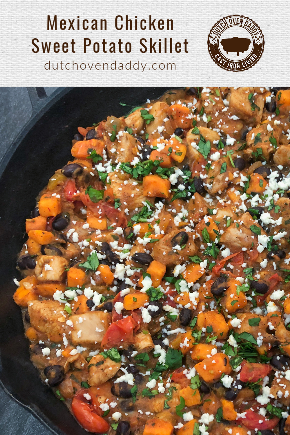 Mexican inspired skillet dinner with chicken, sweet potatoes, black beans, tomatoes, garnished with cilantro and queso fresco.