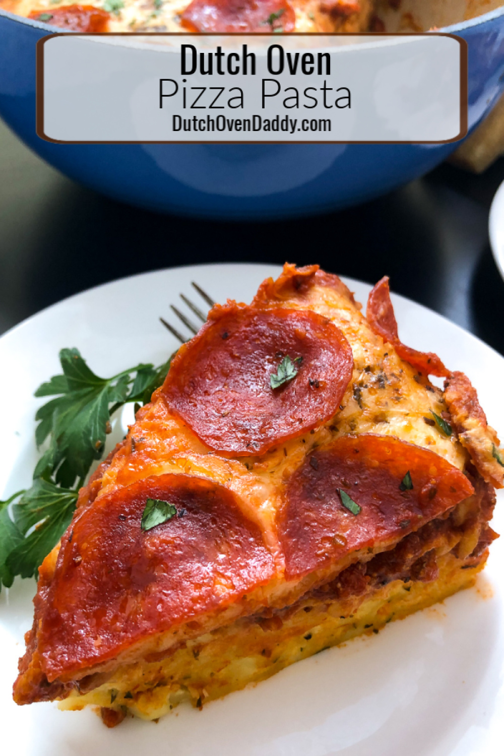 A slice of Dutch oven pizza pasta that looks like a slice of pepperoni pizza.