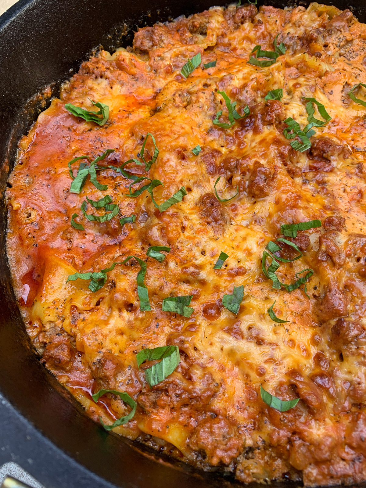 A Dutch oven lasagna after cooking.