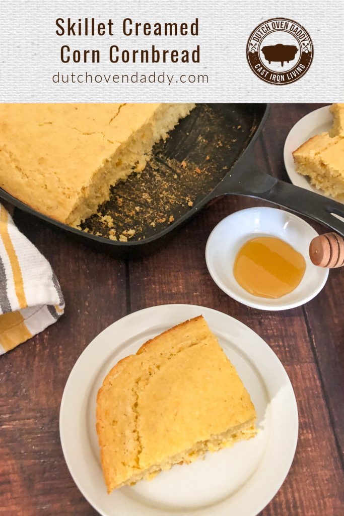 Branded image of skillet creamed corn cornbread; a slice on a white plate near honey, and the remaining in the skillet in the background. 