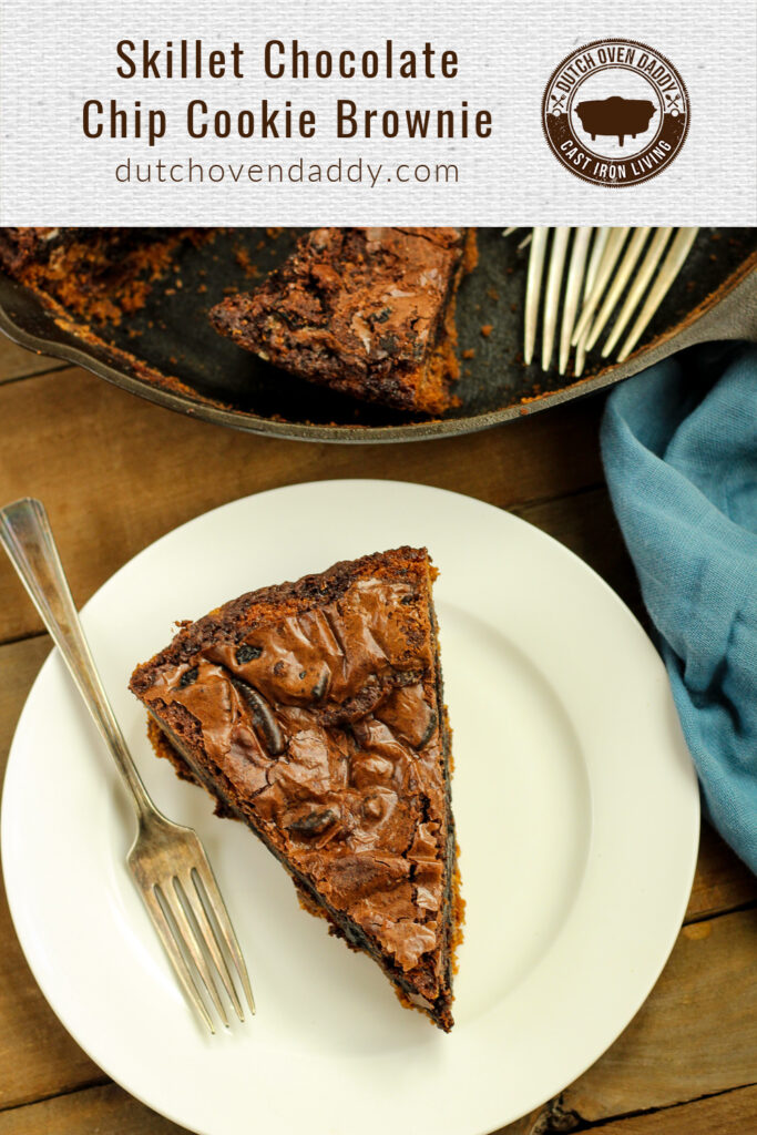 Branded image of the chocolate chip cookie brownie on a white plate and the cast iron skillet in the background.