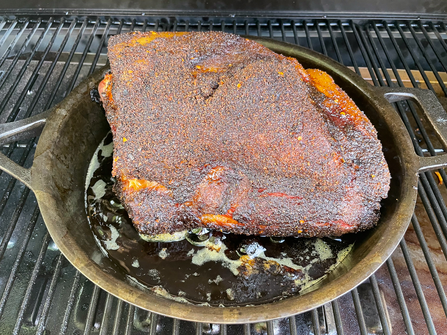 The smoked pork shoulder is fully cooked and has rested. 