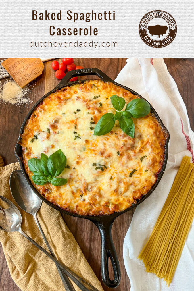 Branded image of Baked Spaghetti Casserole fresh from the oven garnished with fresh basil.