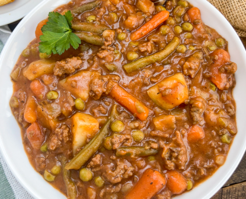 Close up of a bowlful of ground beef stew.