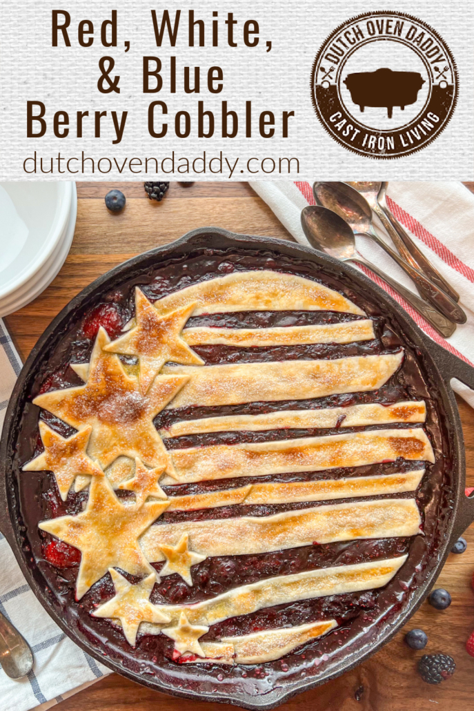 Branded image of the baked Red, White, and Blue Berry Cobbler in a cast iron skillet.