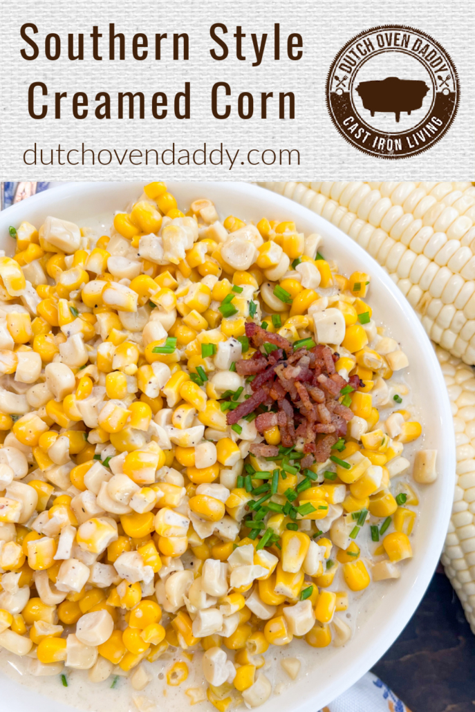 Branded image of southern creamed corn in a white bowl garnished with chives and bacon crumbles.