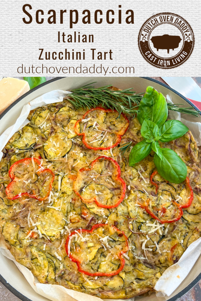 Branded image of zucchini tart in a red cast iron enameled dutch oven.