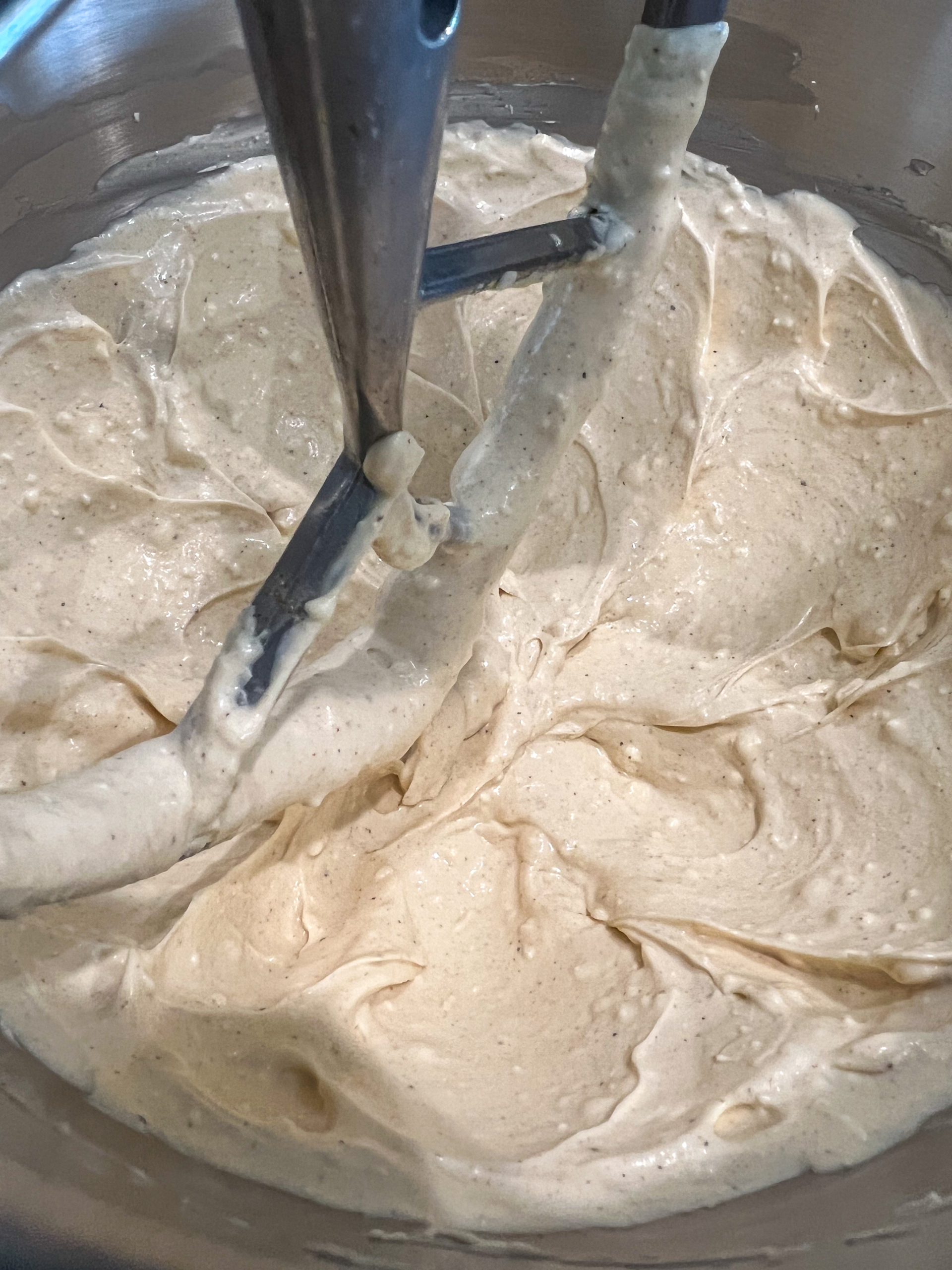 Cream cheese, seasonings, mayonnaise, and worcestershire sauce creamed together in a mixing bowl.