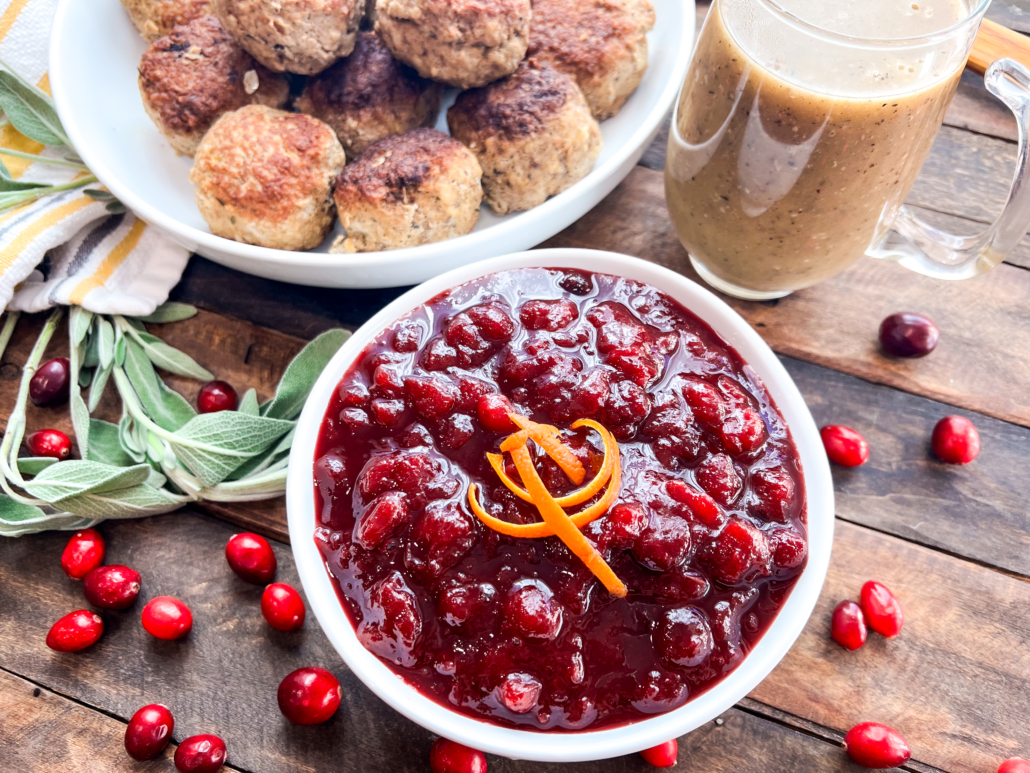 Easy and simple homemade cranberry sauce ready to serve with turkey and stuffing meatballs and gravy.