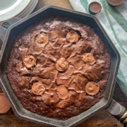 Peanut butter cup brownies in a cast iron skillet.