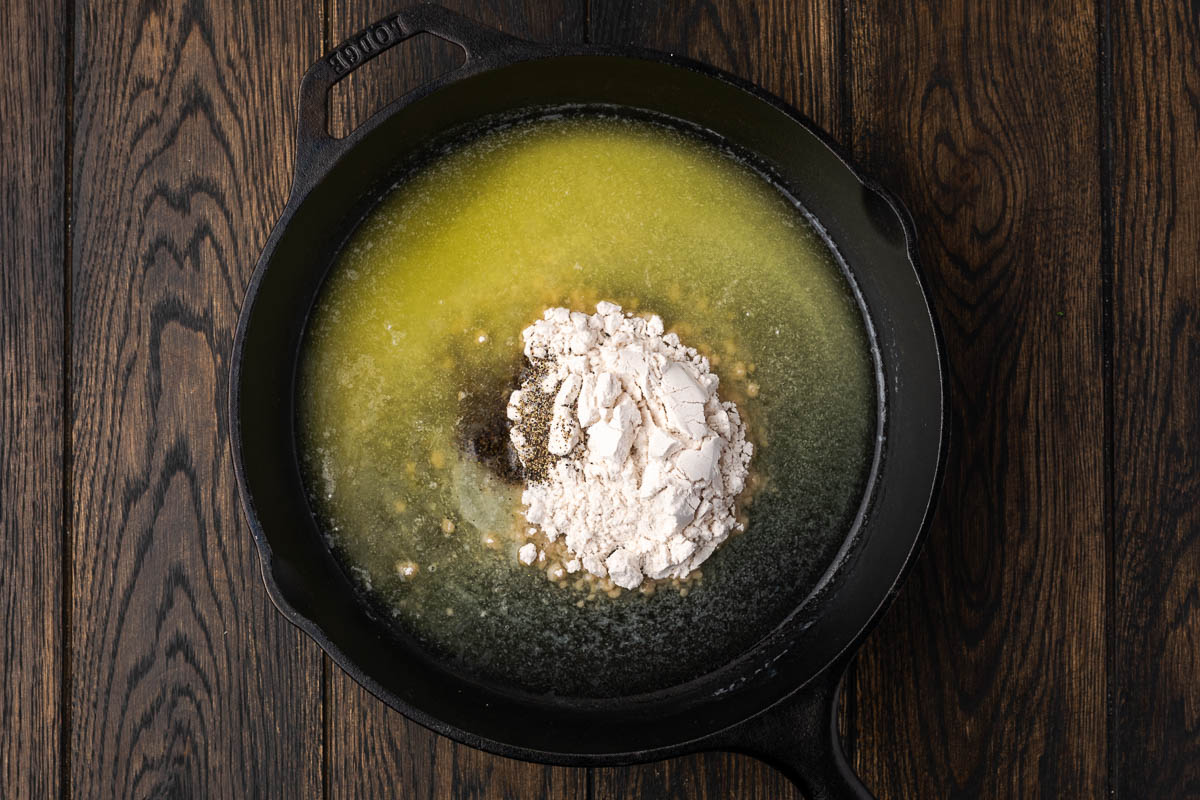 Ingredients to make the roux in the skillet.