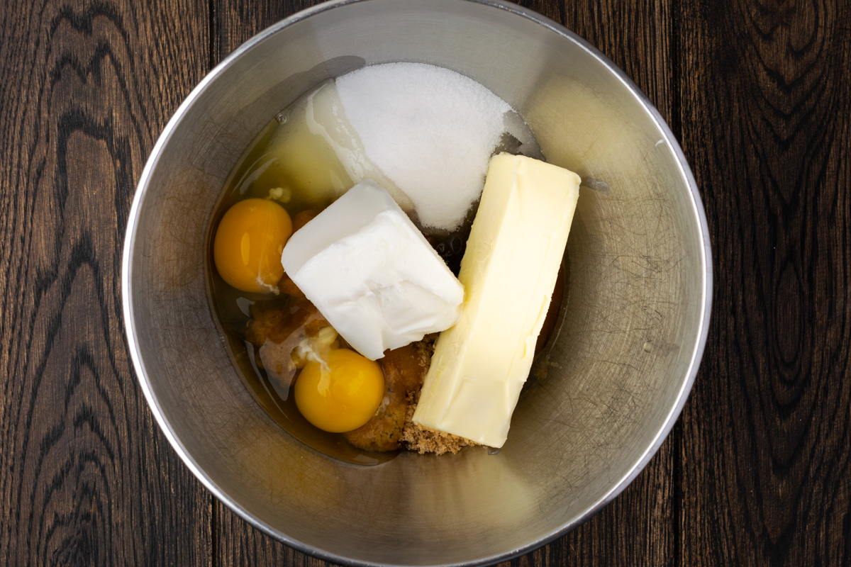 all wet ingredients in a mixing bowl for oatmeal chocolate chip cookies.