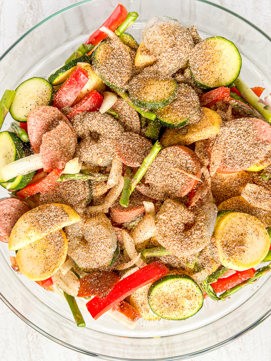 Spices and mixture in a mixing bowl.