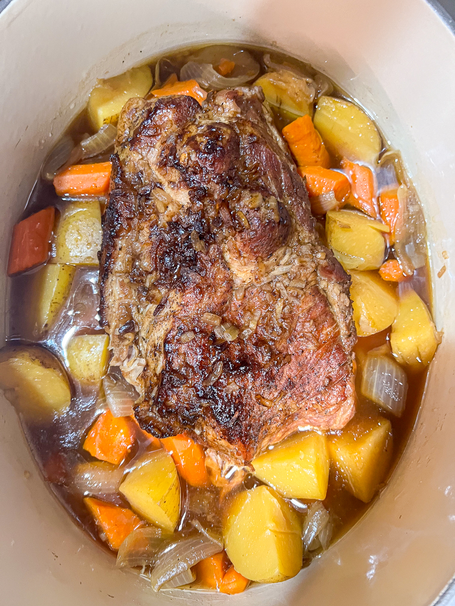 Fresh from the oven, the pot roast is resting before serving.