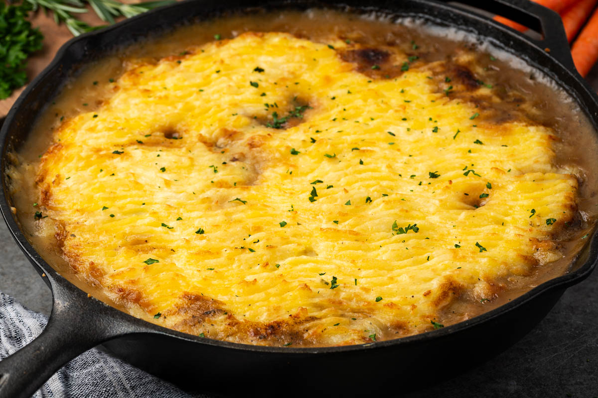 Baked skillet shepherd's pie on a table. 