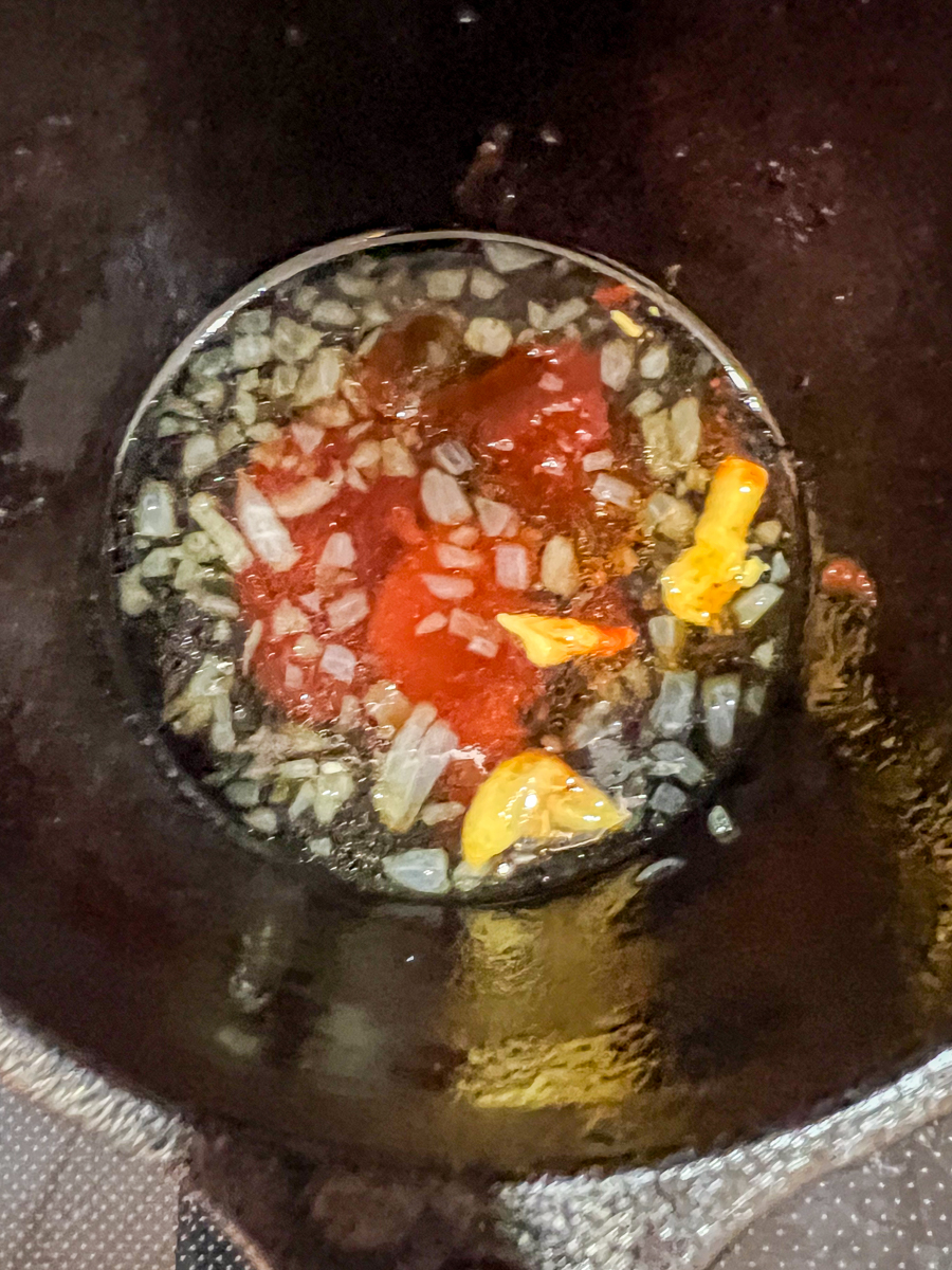 Cooking the shallots to make the sauce.