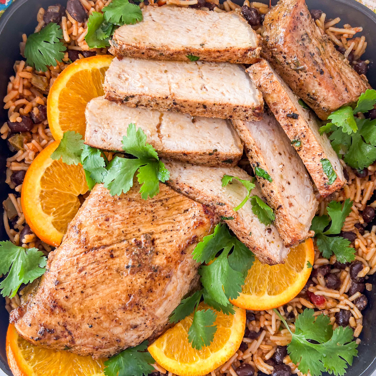 Close up of the pork over rice and beans.