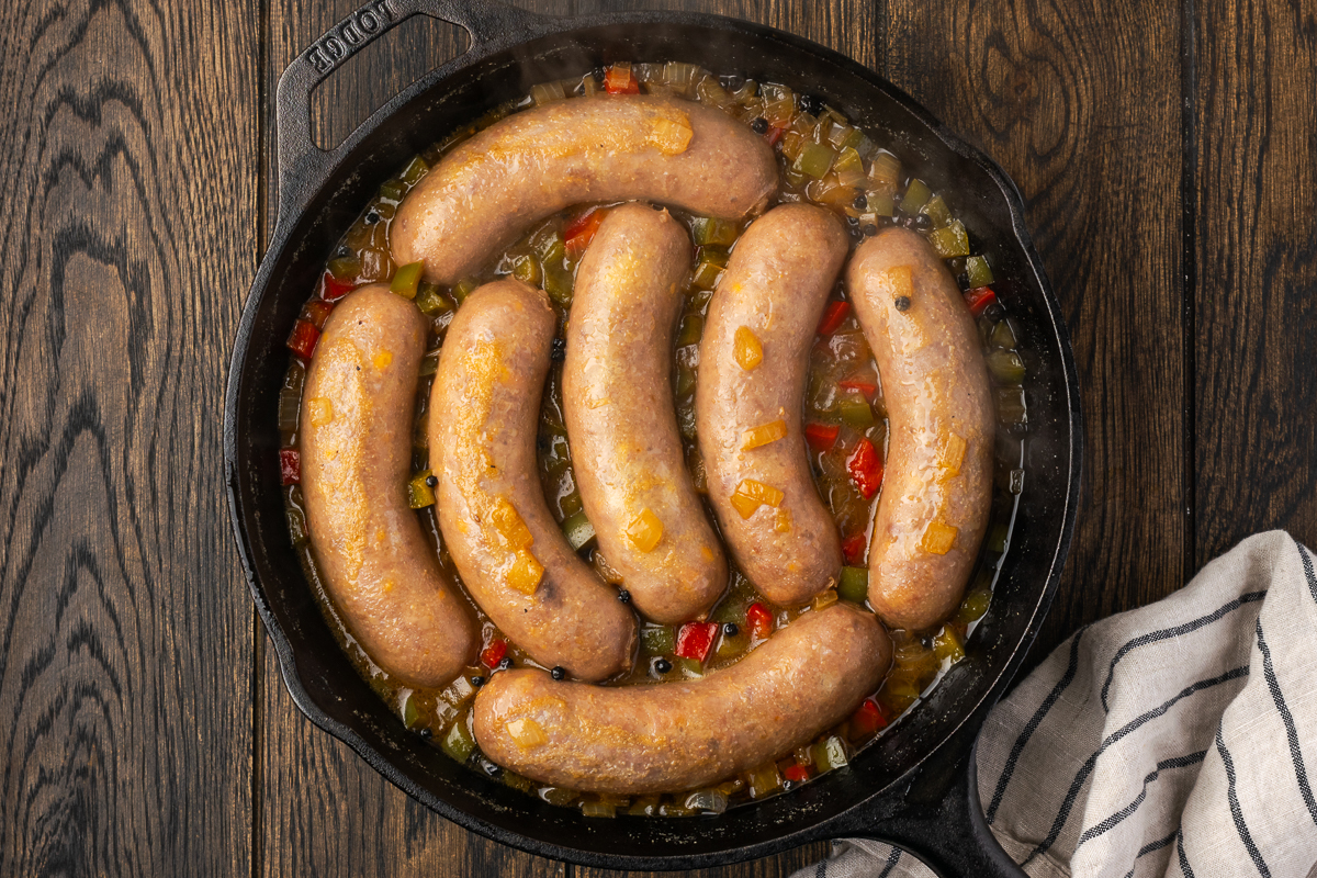 Beer brats after cooking in the liquid.