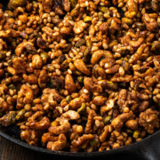 Cinnamon nuts cooked in a skillet.