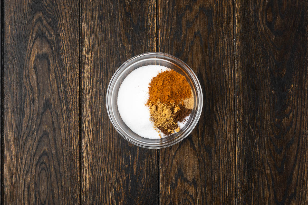 Ingredients to make sugary coating in a bowl.