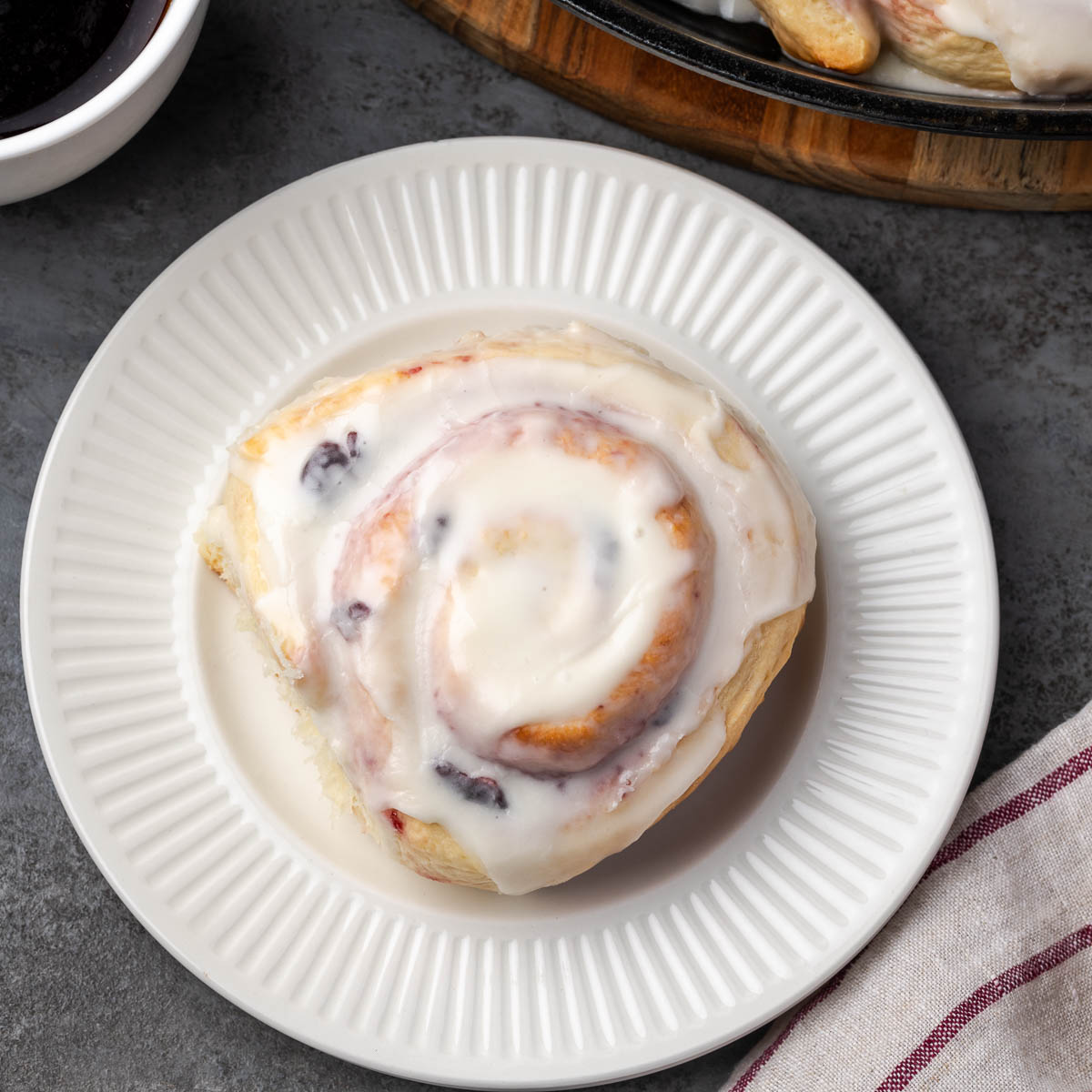 A cherry roll on a plate.