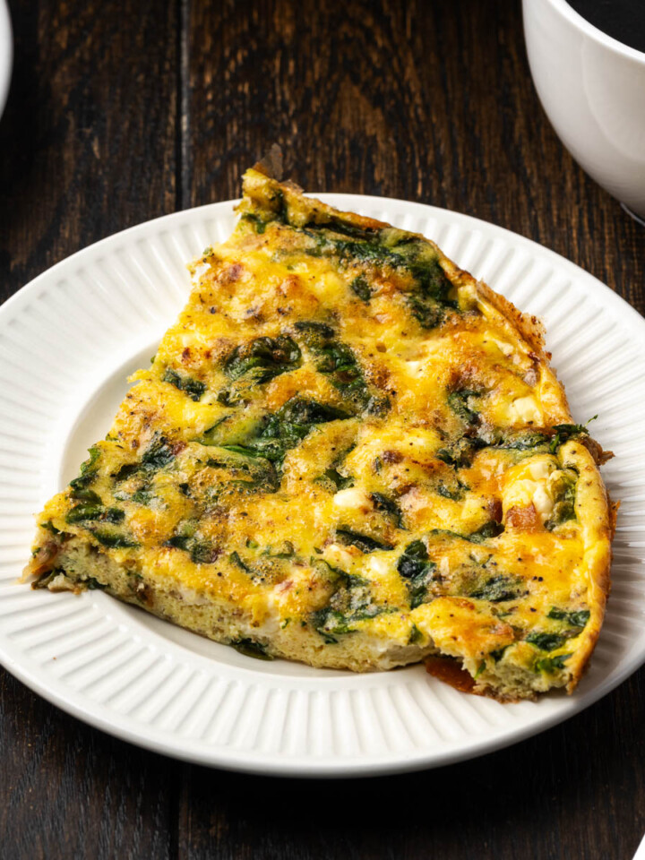 A serving of spinach frittata on a plate.