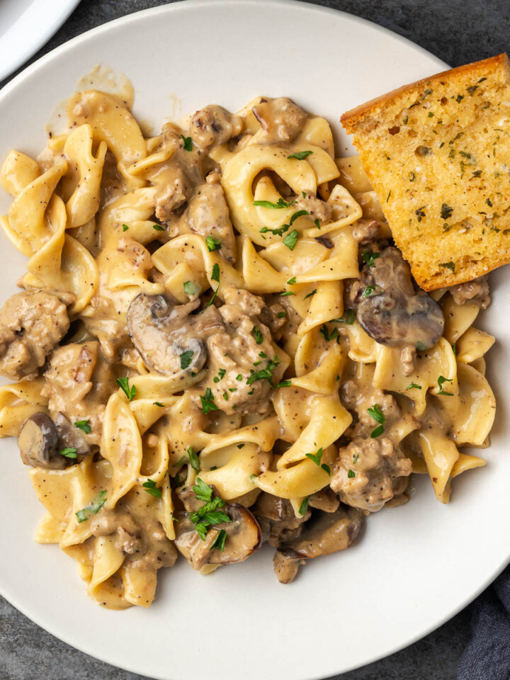 Ground turkey stroganoff on a white plate.