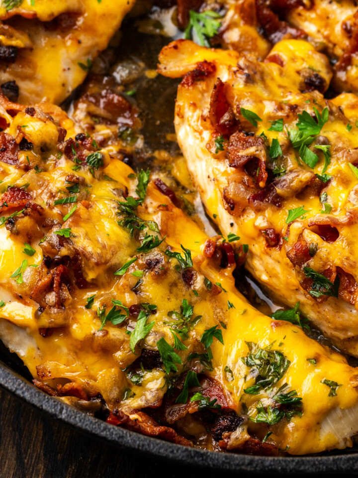 Cheesy bacon chicken cooked in a skilet.