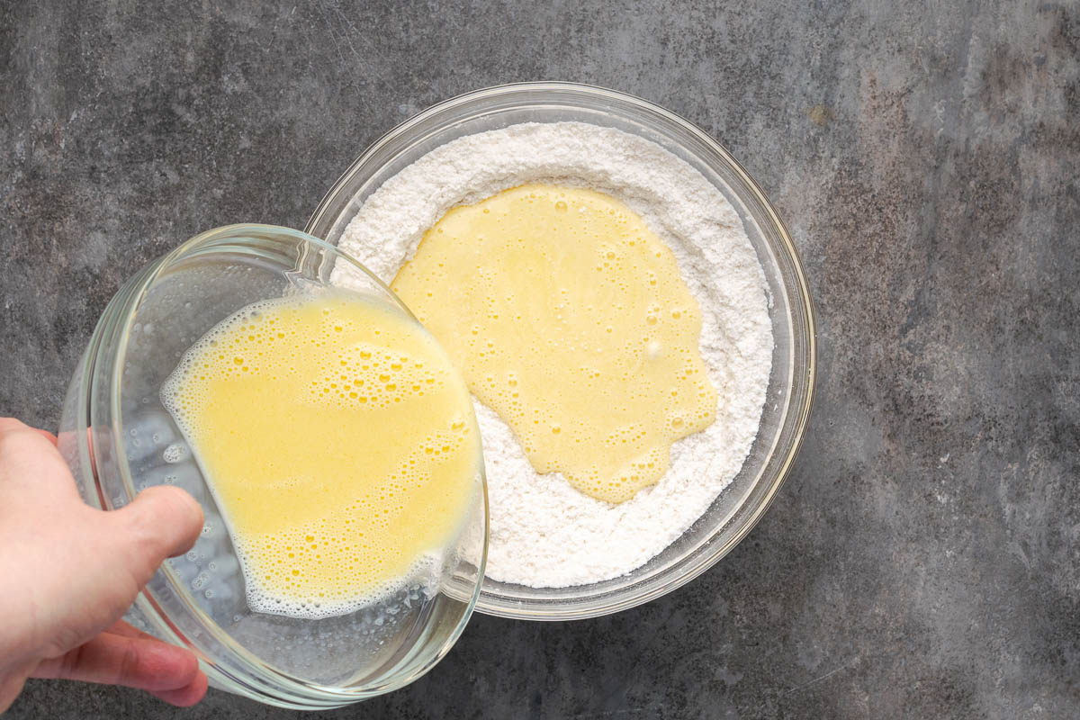 Adding the wet ingredients to the dry.