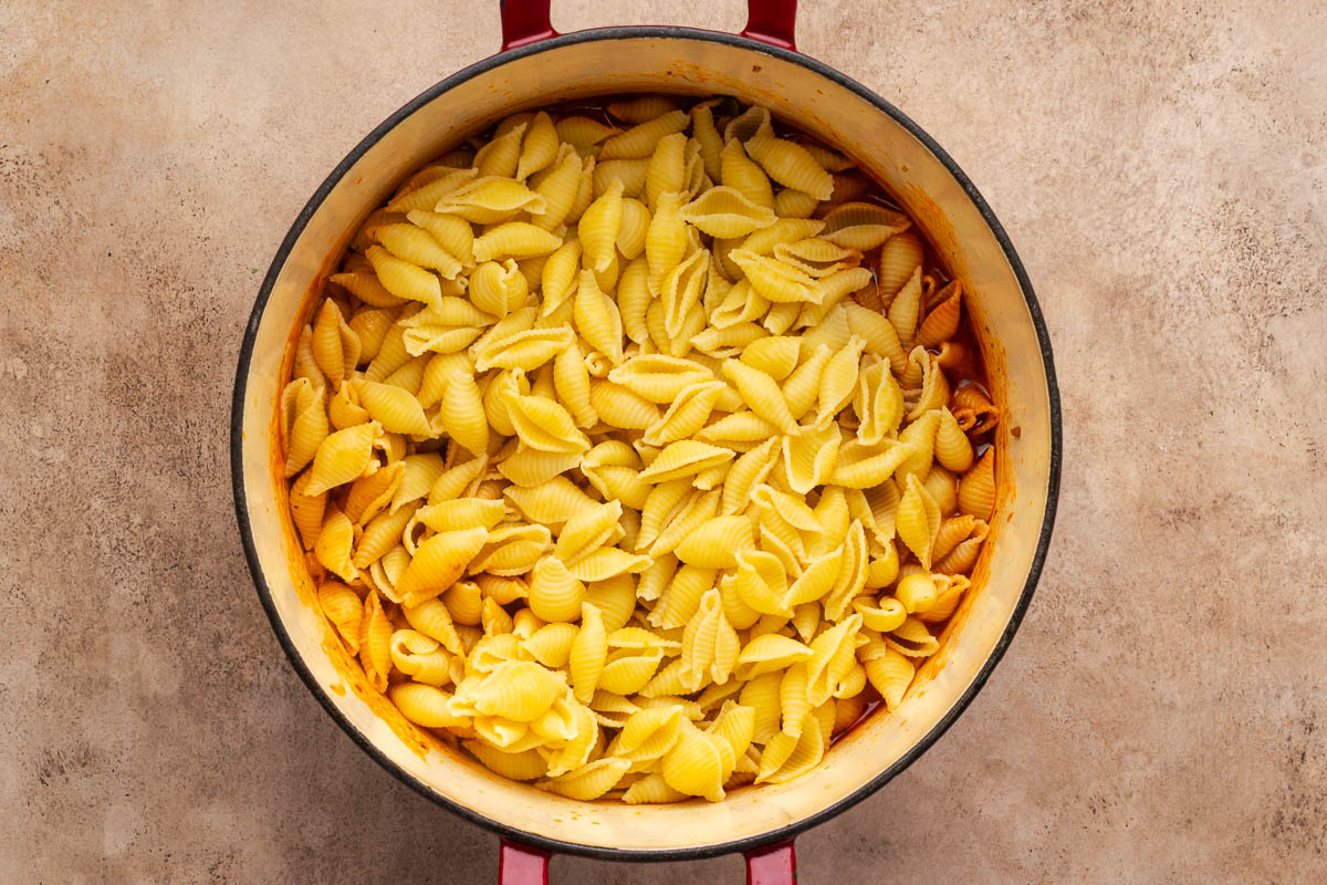 Pasta added to the pot with the sauce.