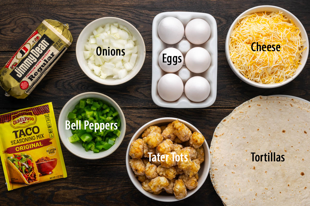 Ingredients to make breakfast burritos on the table.