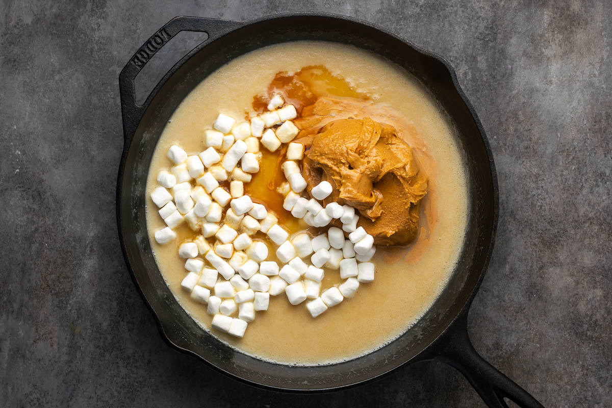 Marshmallows and peanut butter added to the melted sugar mixture.