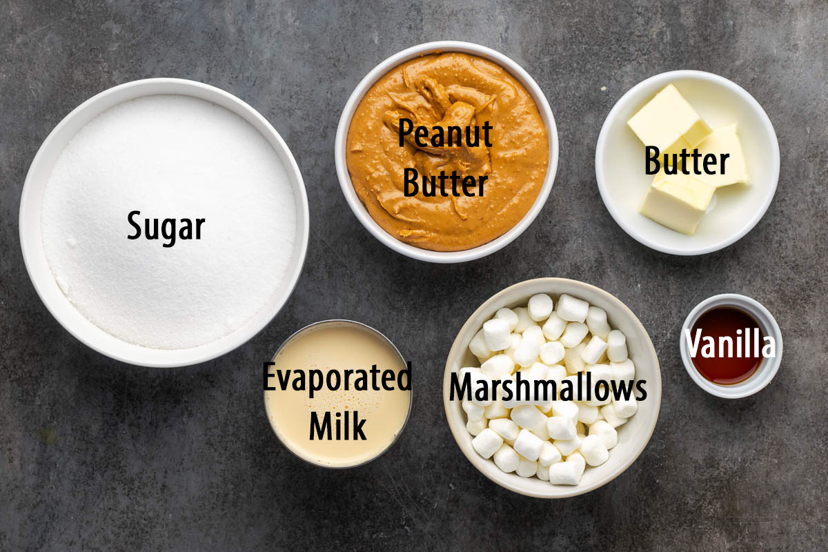 Ingredients to make homemade peanut butter fudge in bowls before preparing.
