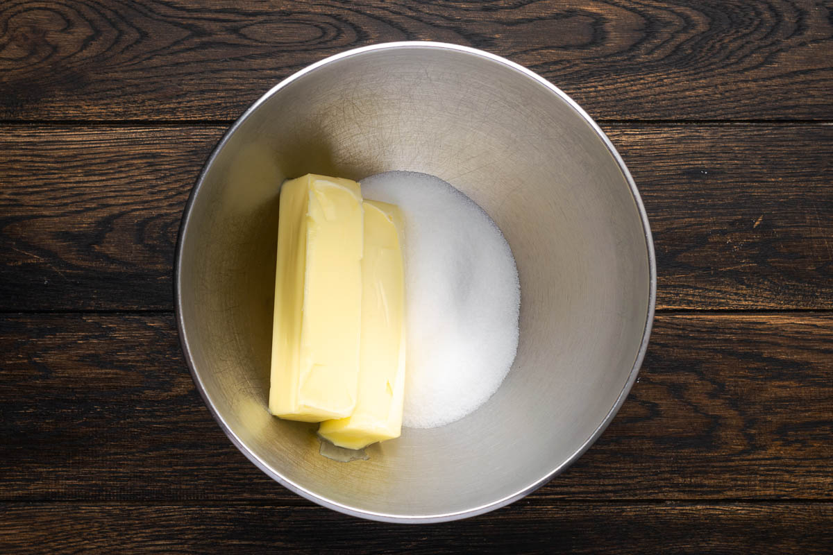 Butter and sugar in a mixing bowl.