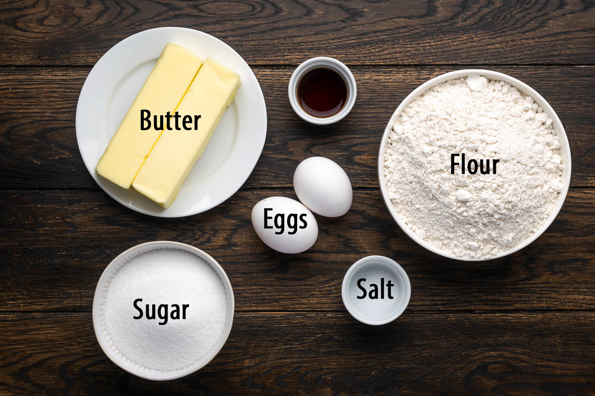 Ingredients to make cast iron sugar cookies on a table with labels.