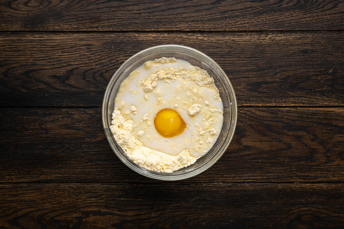 Egg, milk, and shortening added to make a batter.