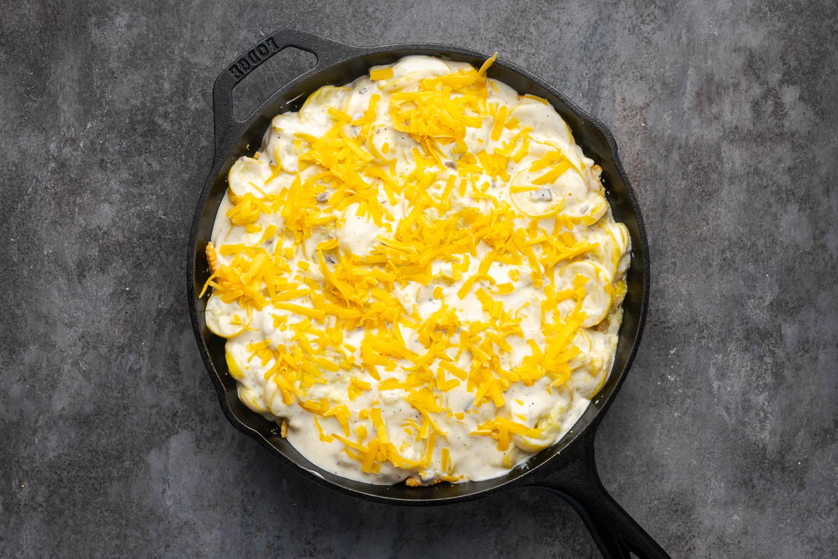 More squash mixture and cheese added on top.