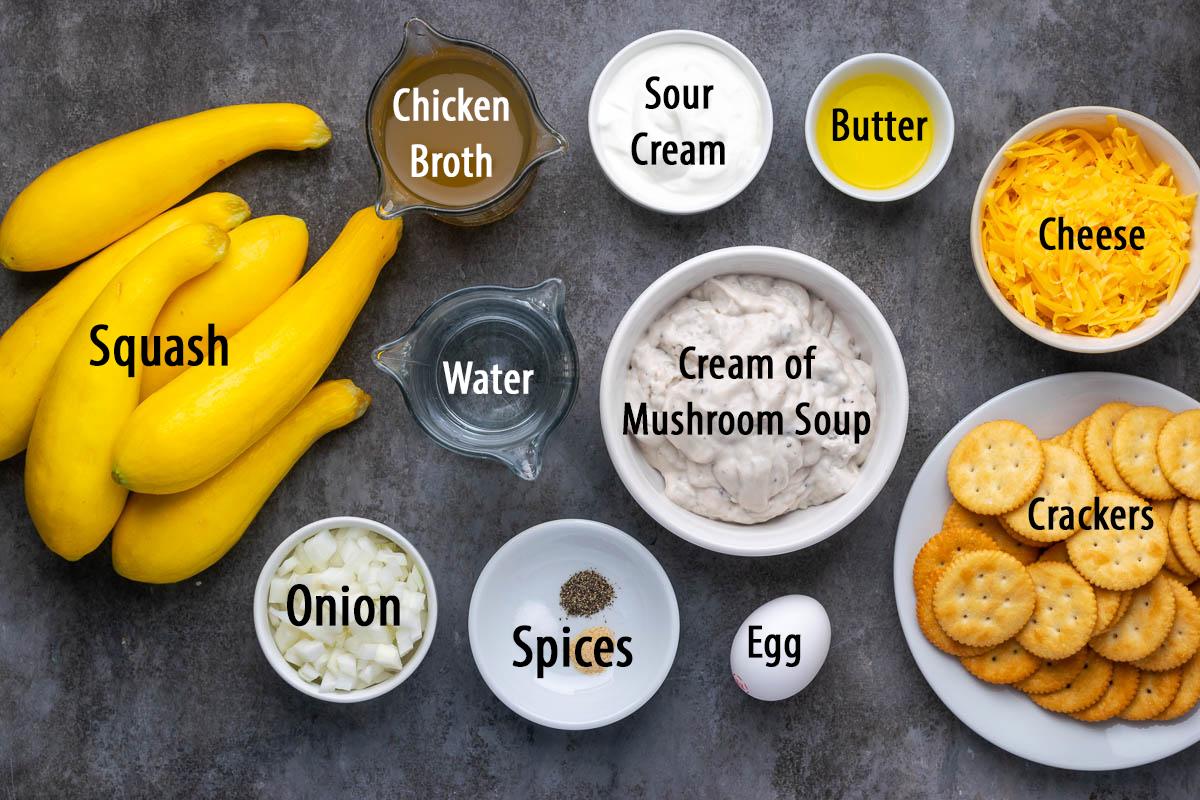 Ingredients to make yellow squash casserole in bowls on a table.