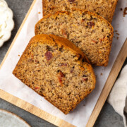 Slices of bacon banana bread on a platter.