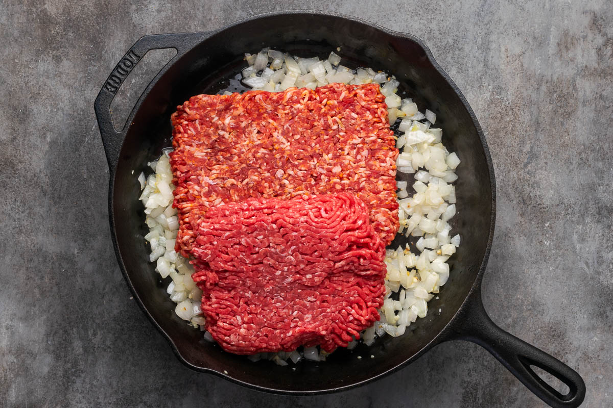 Meat added to the cooked onions.