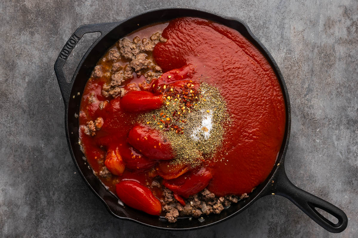 Sauce ingredients added to the meat mixture.