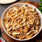 Southwest chicken shredded in a serving bowl.