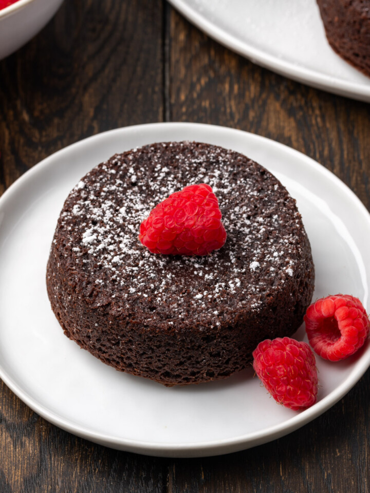 Mini lava cakes on a plate.