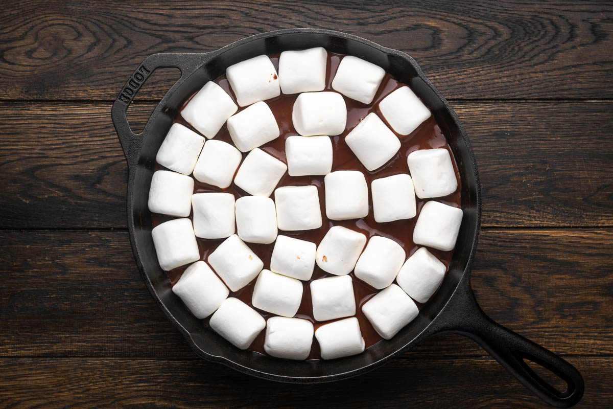 Marshmallows on top of the melted chocolate ganache.