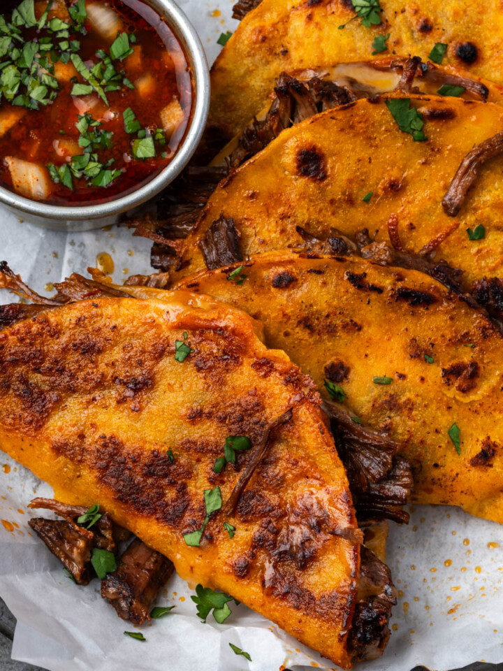 Dutch oven barria inside of a taco shell.