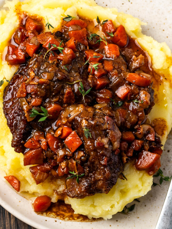 Braised short ribs over potatoes.