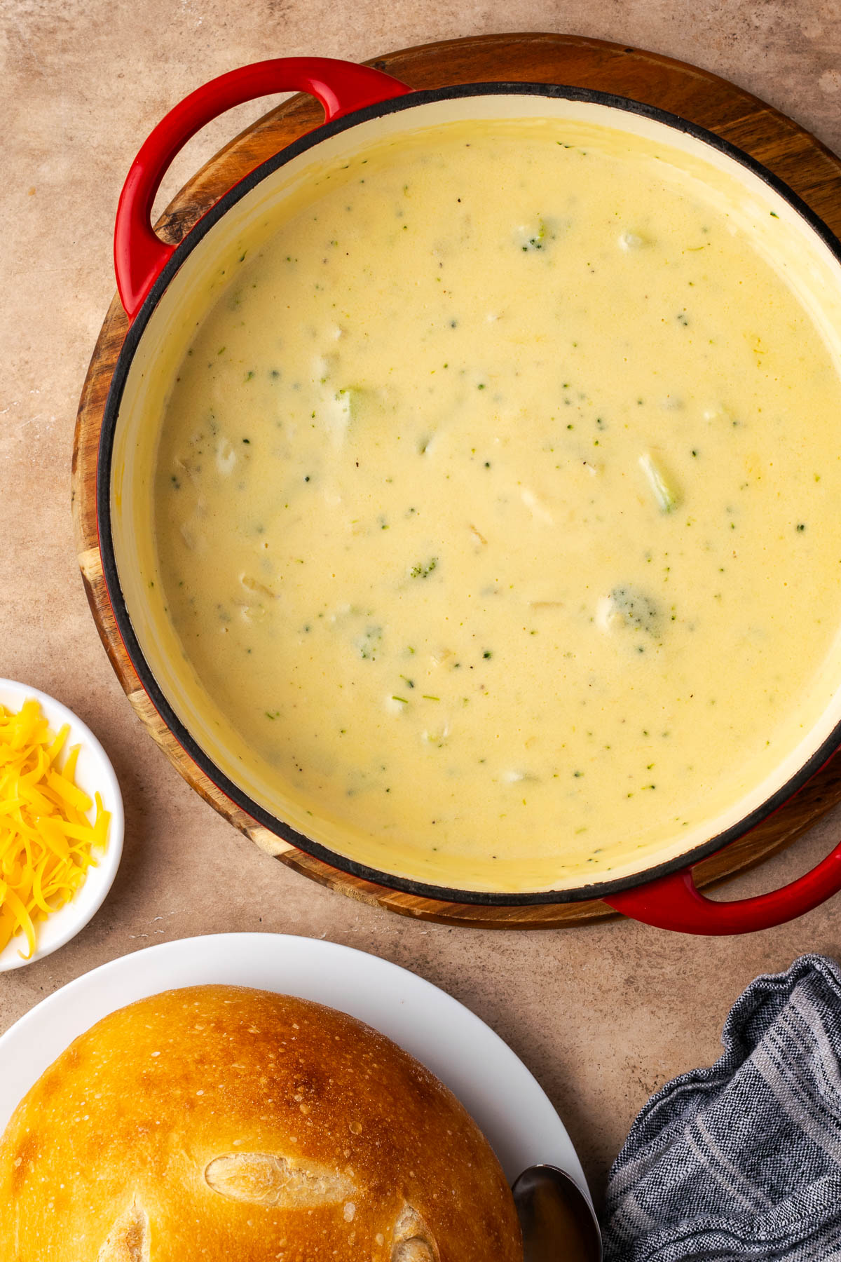 Soup with broccoli and cheese in a dutch oven.