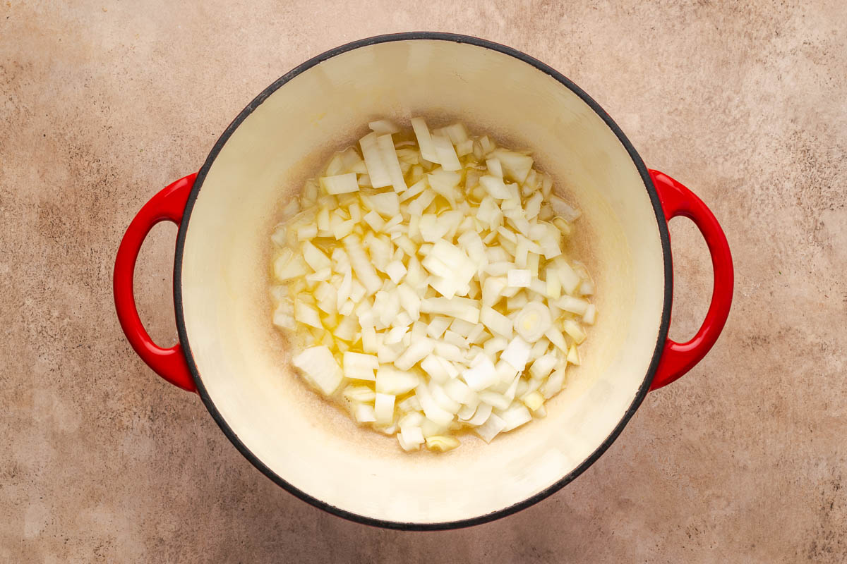 Butter diced onions cooking in the dutch oven.