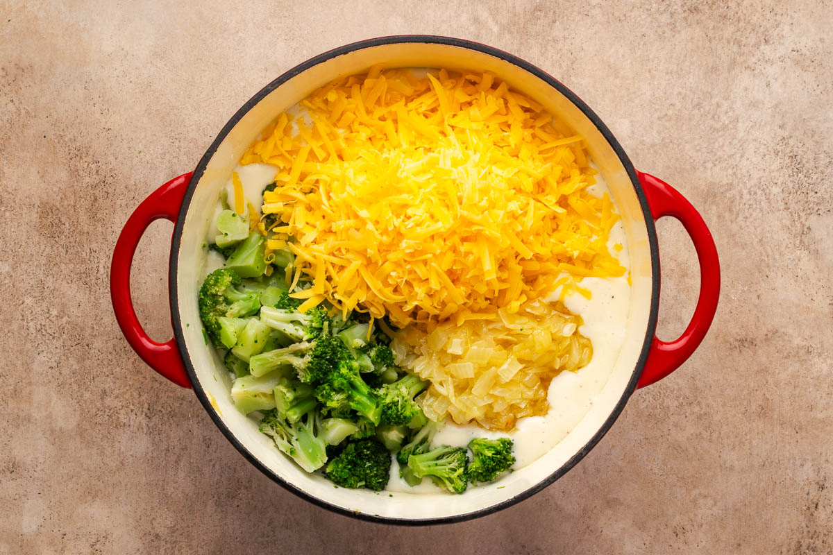 Broccoli, onions and cheese added to the sauce.